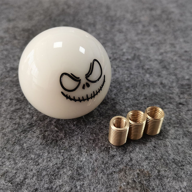 Custom white smiley face shift knob